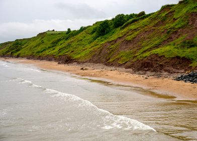 Coastal Cliffs and Sandy Beach