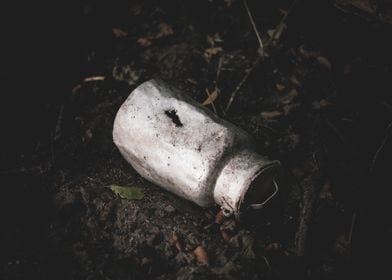 Old Milk Can in Forest