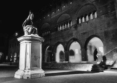 Statue in Front of Building in Rimini historical center by night