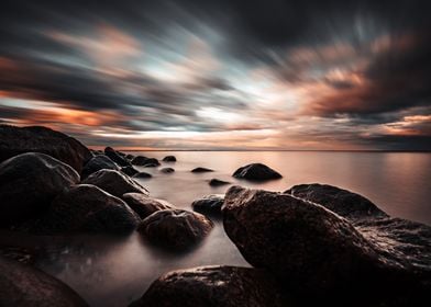 Stormy Sunset Seascape with Rocks