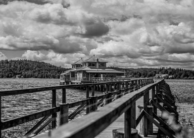 Wooden Pier and Lake House