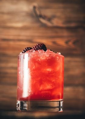 Bourbon Renewal cocktail garnished with blackberries