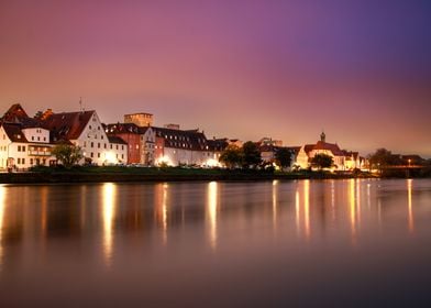 Riverfront Cityscape at Dusk