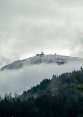 Snowy Mountain Peak with Tower