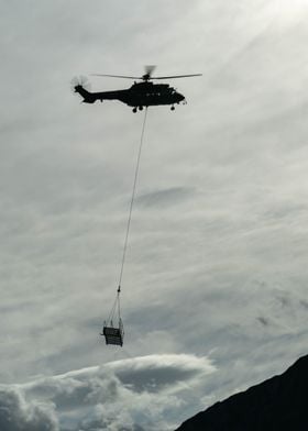 Helicopter Lifting Cargo Axalp