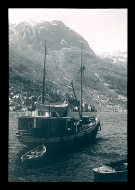 Boat Docked in Fjord