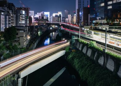 Night Cityscape with Train Tracks