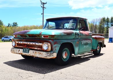 Photo of a vintage step side chevy truck. 