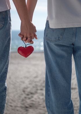 Couple Holding Hands with Heart