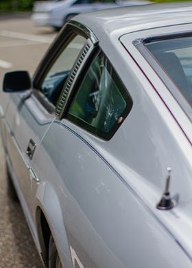 Silver Datsun Rear Side View