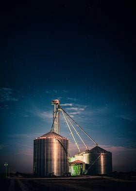 Grain Silos Under Stars