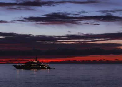 Sunrise and a yacht