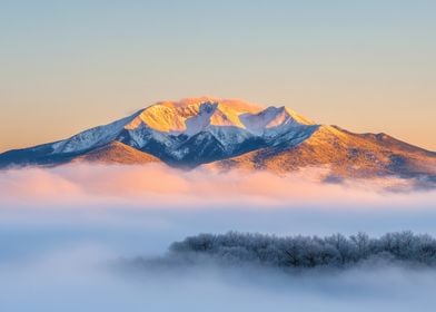 Snowy Mountain Peak at Sunrise