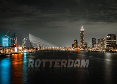 Rotterdam skyline at night with caption