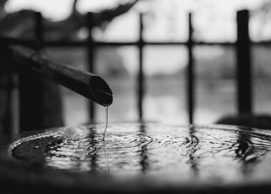 Water Droplet in Stone Basin