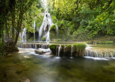 Waterfall in Lush Forest in France