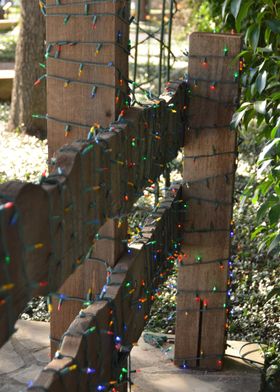 Festive Light on Fence Post