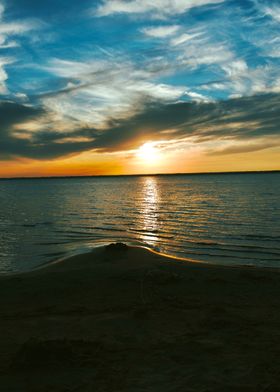 Sunset Clouds Splitting Blue from Gold