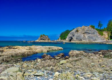 Rocky Coastline with Turquoise Ocean Water Showcasing the Hole-in-the-Wall