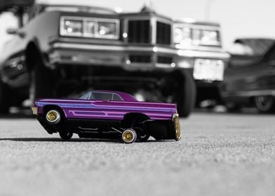 Purple Lowrider Model Car at Car Meet