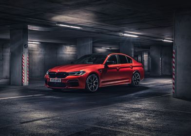 Red BMW M5 in Garage