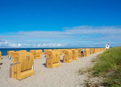 Beach Chairs on Sandy Shore