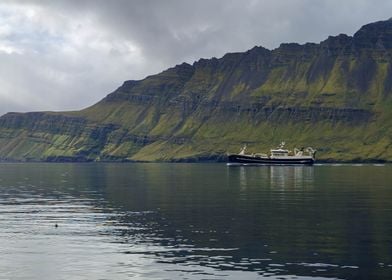 Fishing Vessel by Cliffs in Iceland