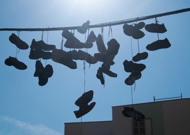 Shoes Hanging on Wires