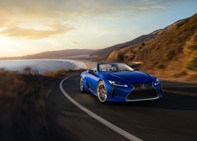 Blue Lexus Convertible on Coastal Road