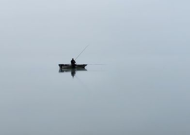 Solitary Fisherman in Fog