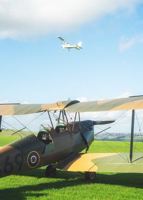 Vintage Biplanes at an Airfield