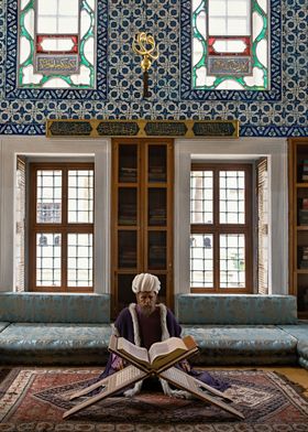 Man Reading in Ornate Room