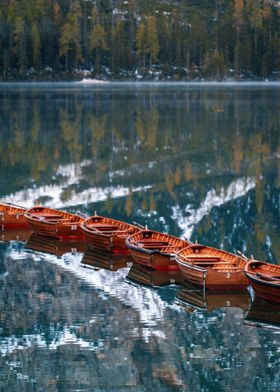 Wooden Boats on Calm Lake