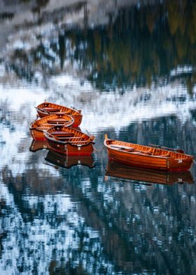 Wooden Boats on Calm Lake