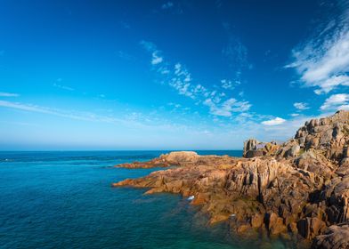 Rocky Coastline with Blue Sky