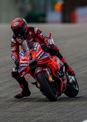 MotoGP Rider Leaning into Turn