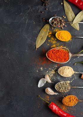 Spices and Herbs on Black Background