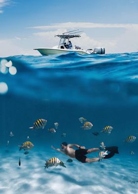 Man Snorkeling Fish