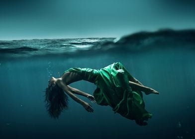 Woman Floating Underwater