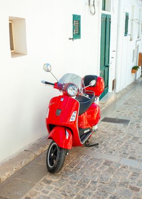 Red Vespa Scooter in Italy