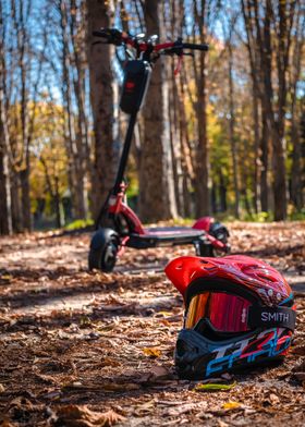 Red Electric Scooter and Helmet