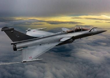 A French Dassault Rafale Jet flies into the sunset