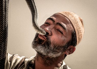 SNAKE CHARMER