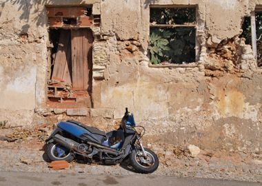 Old facade and scooter