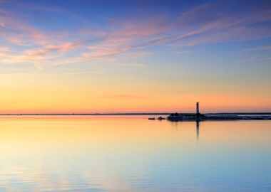 Lighthouse In The Sea At T