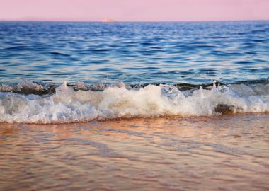 Wave Hitting A Beach At Su