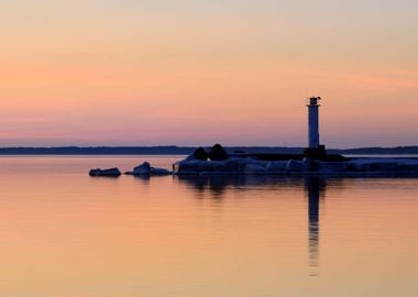 Lighthouse In The Sea At T