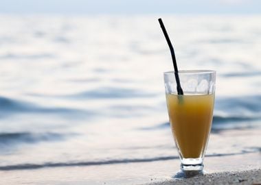 Glass Of Cocktail On Beach