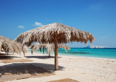 Straw Beach Umbrellas At A