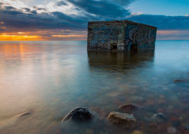 Rocky Sea Shore With Old B